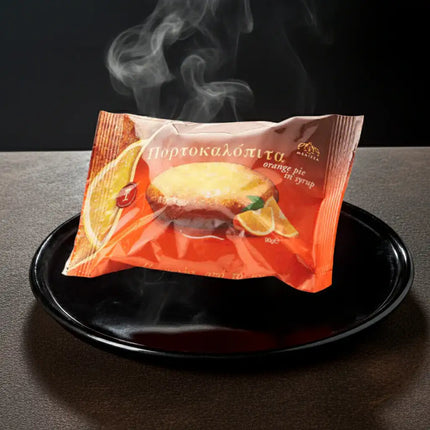 Detailansicht Portokalopita 90g Toumpourleka – aromatischer Orangenkuchen, einzeln verpackt und verzehrfertig.