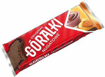 Die Packung Góralki Nougat Waffel 45g der Firma GEtca GmbH enthält zehn knusprige Waffelriegel mit cremiger Nougatfüllung – perfekt für einen süßen Genussmoment unterwegs oder zu Hause.