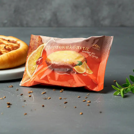 Portokalopita 90g von Toumpourleka – griechische Kuchenspezialität mit Orange, ideal als Dessert oder zum Kaffee.